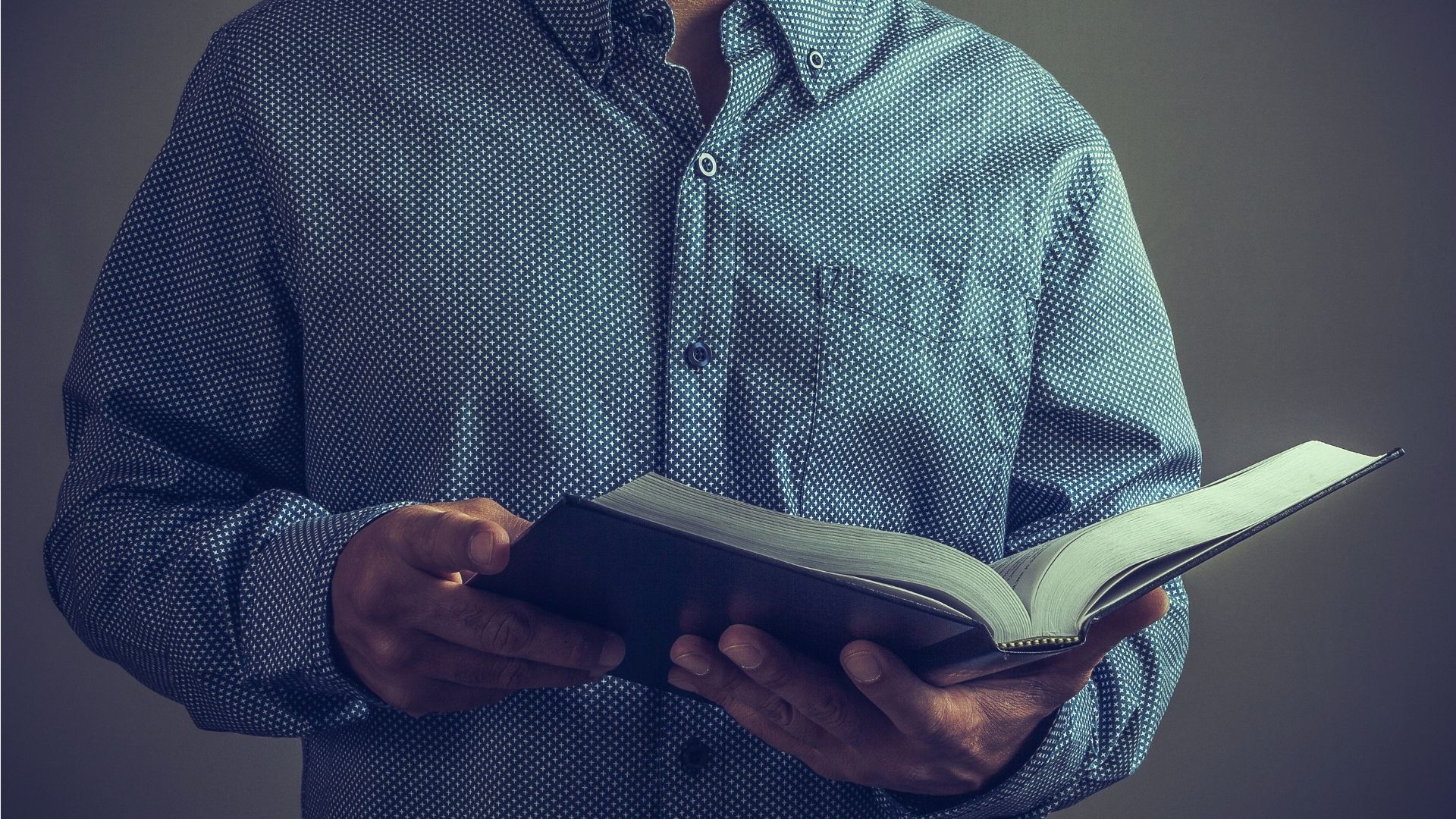 man with bible sharing prophecy